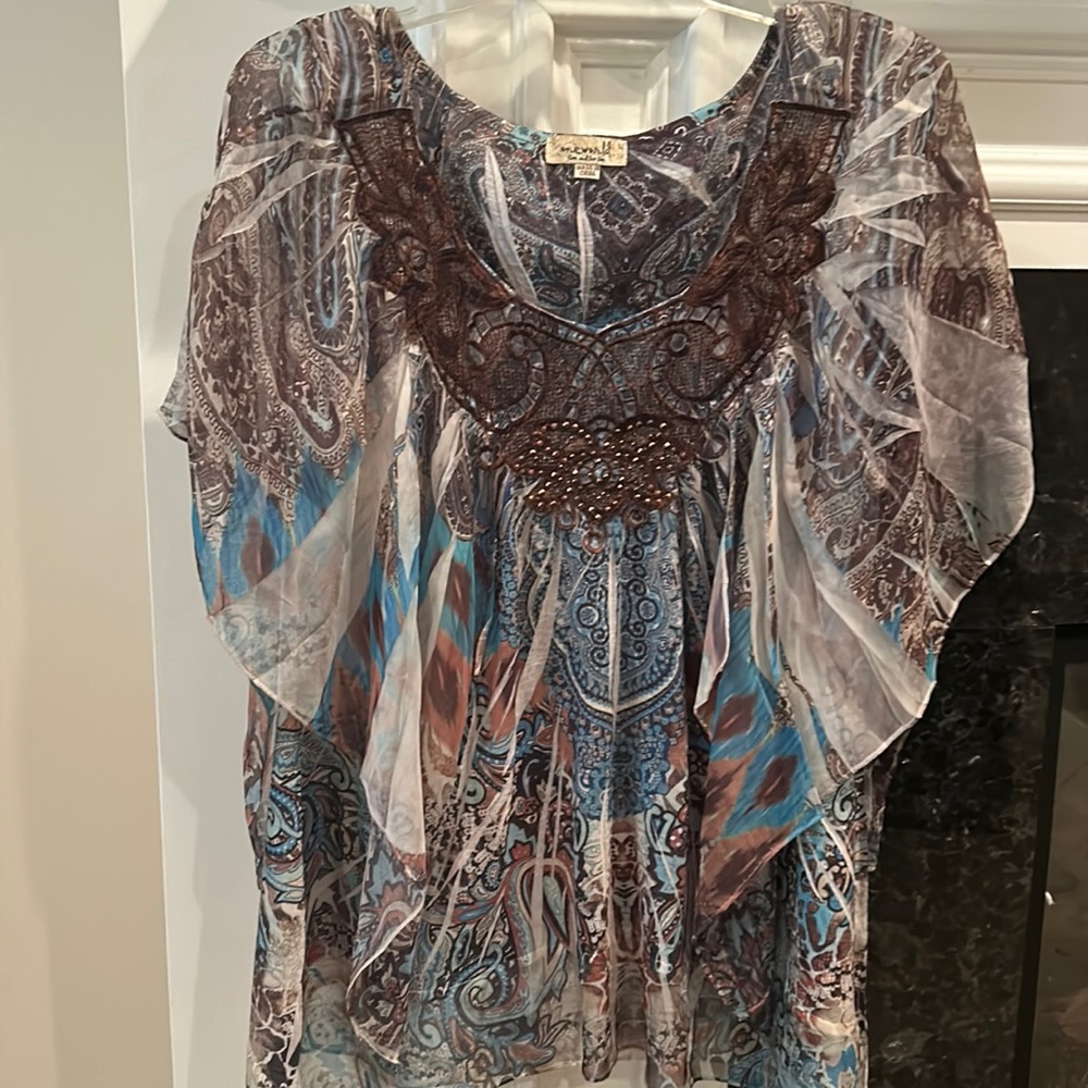 Wispy One World Top